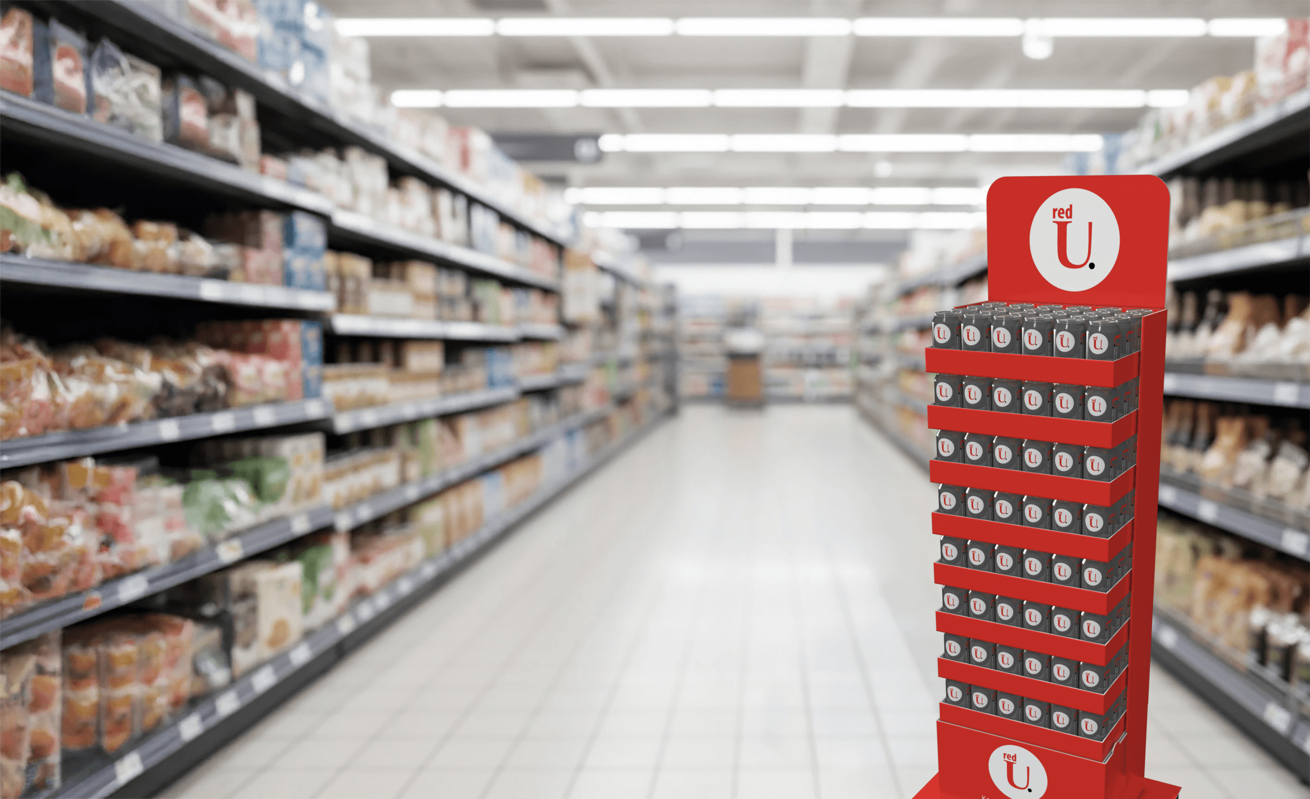 POS-Display von red-U im Supermarktgang: rotes Bodendisplay mit Produktdosen
